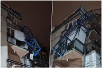 Олујни вјетар забио кран у зграду, станари у шоку (FOTO)